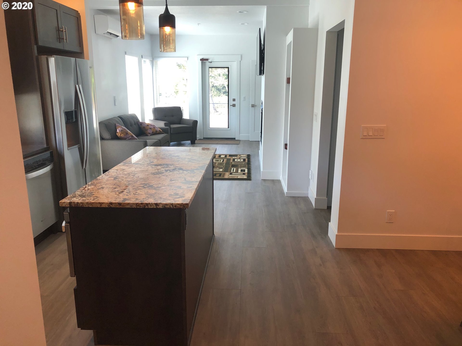 94353 Leith Road Gold Beach, OR 97444 - Photo 6 of 30 a kitchen with stainless steel appliances granite countertop a refrigerator and a sink