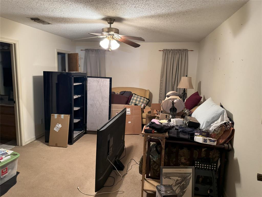 522 Twin Point Drive Benton, LA 71006 - Photo 25 of 33 Bedroom featuring light carpet, a textured ceiling, and ceiling fan
