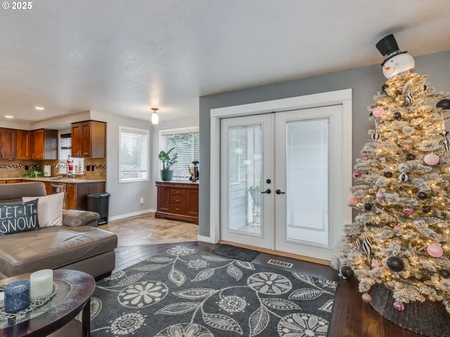 a living room with furniture and a rug