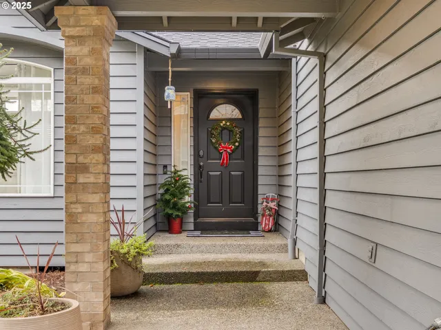 a view of a door of the house and outdoor space