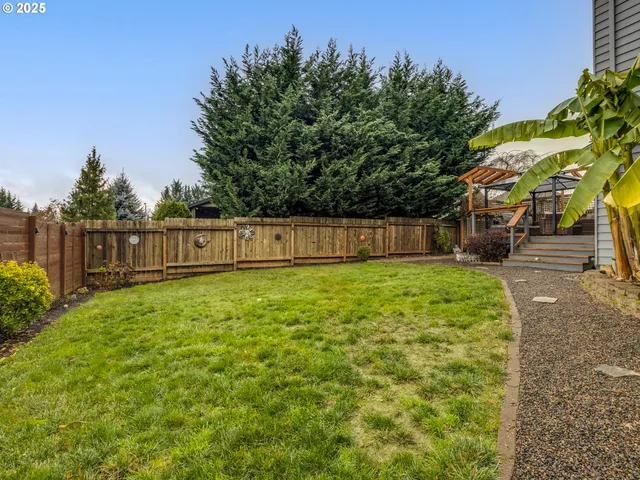 a view of a backyard with green space