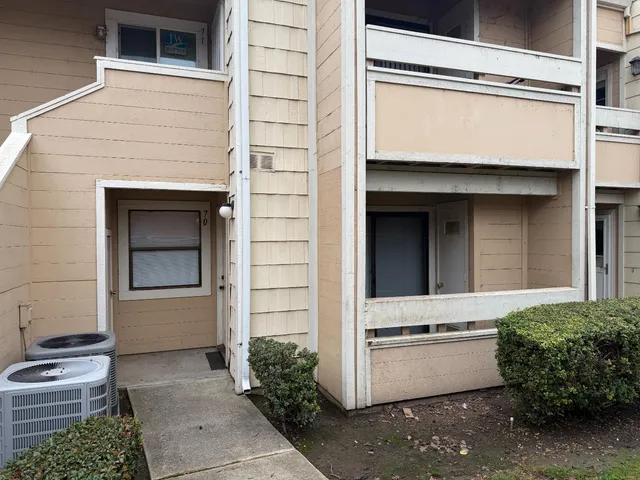 a front view of a house with a garage