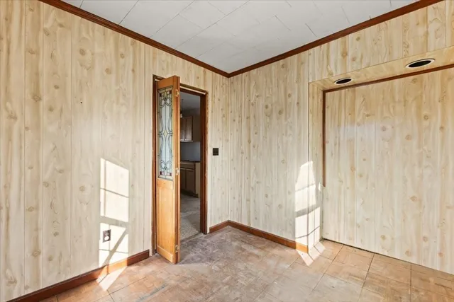 a kitchen with sink and cabinets