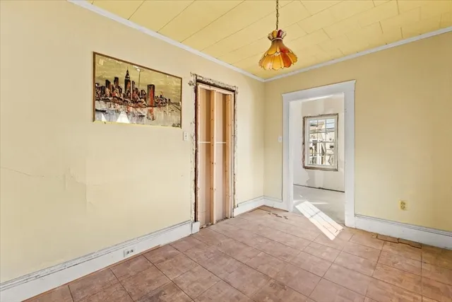 an aerial view of a city with ocean view