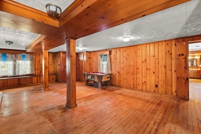 a bathroom with a sink a mirror and a shower