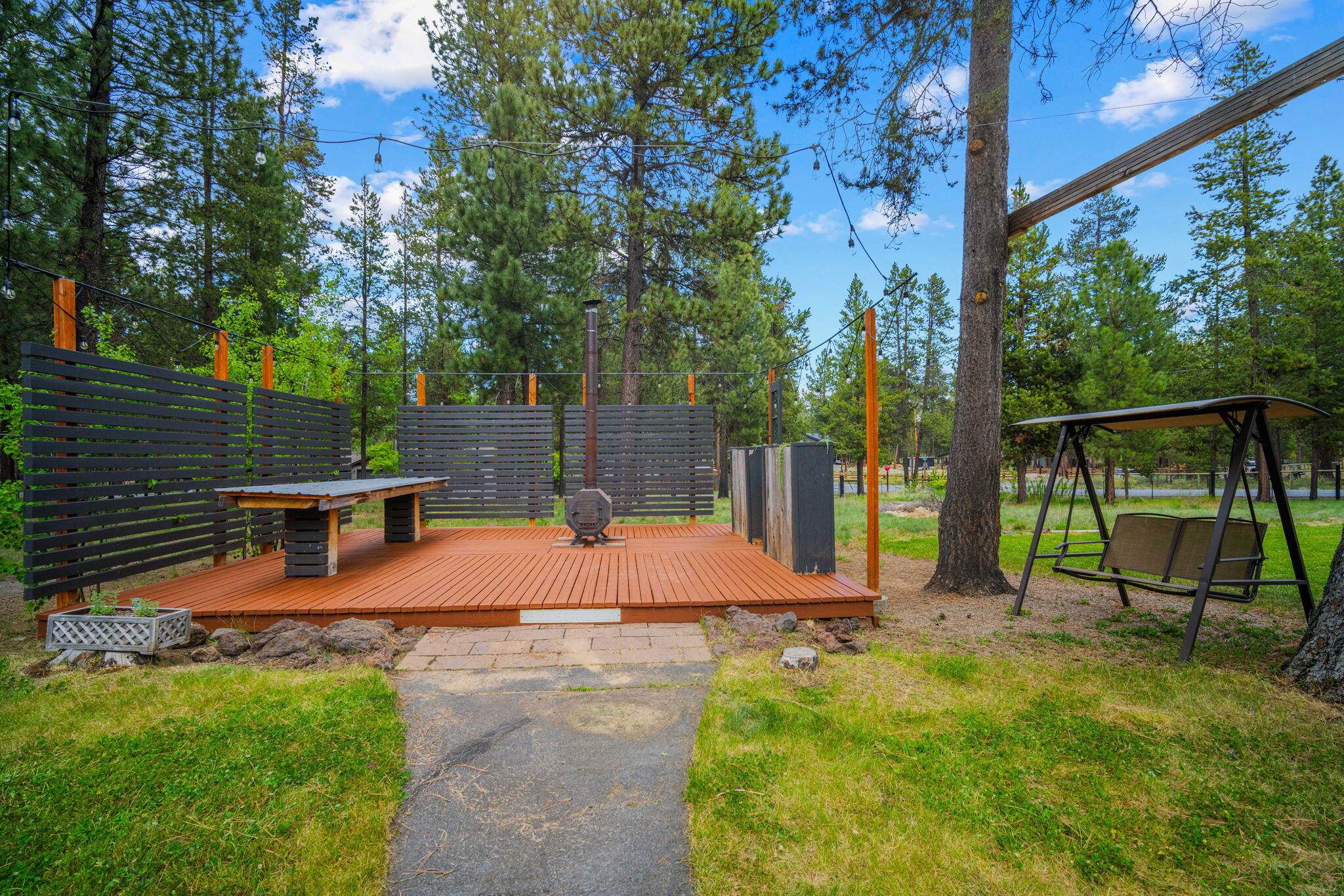 55965 Blue Eagle Road Bend, OR 97707 - Photo 39 of 44 Separate patio deck with electricity