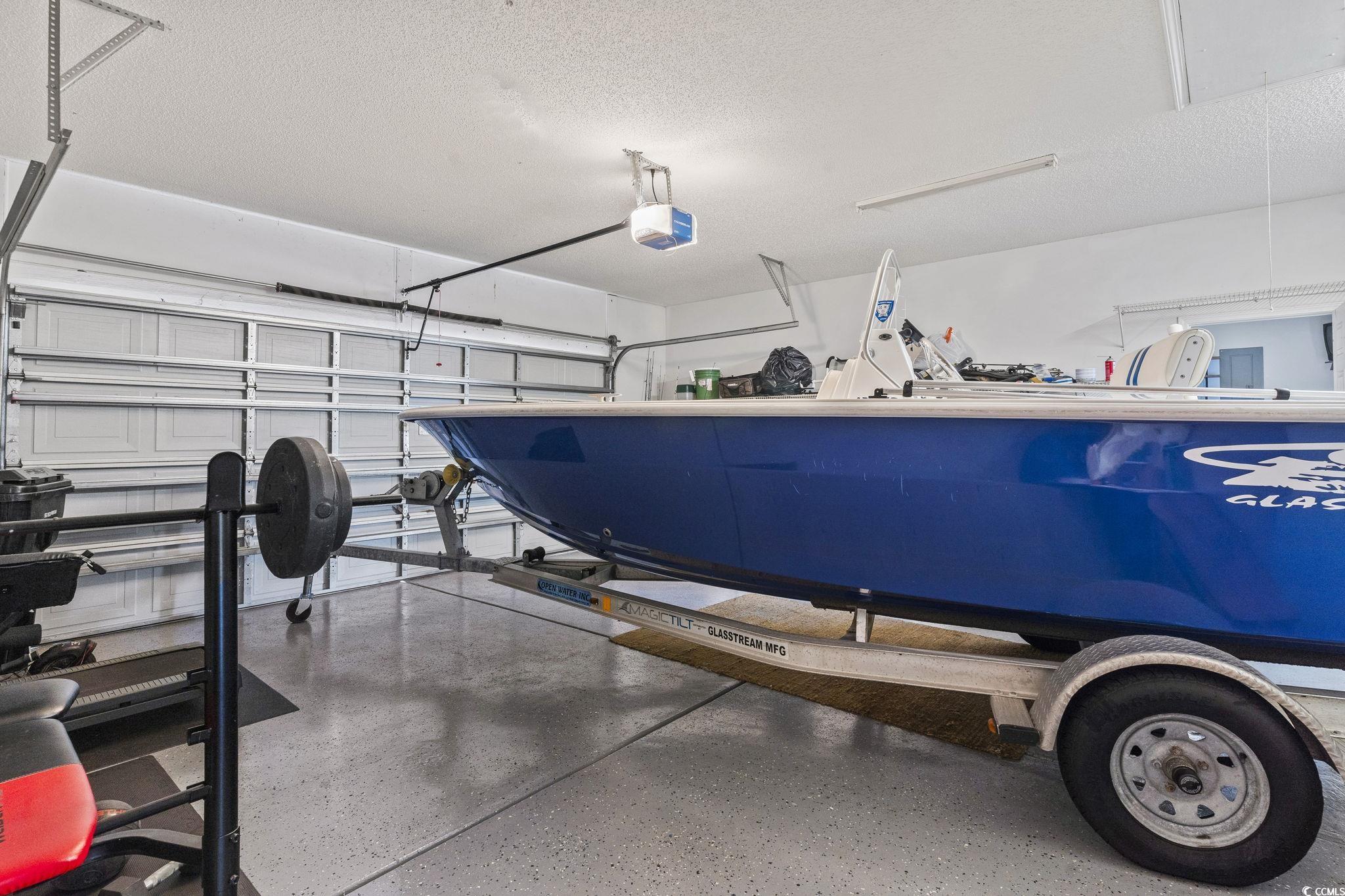 212 Duchess Court Myrtle Beach, SC 29588 - Photo 13 of 40 Current Owner houses their 17' boat in garage