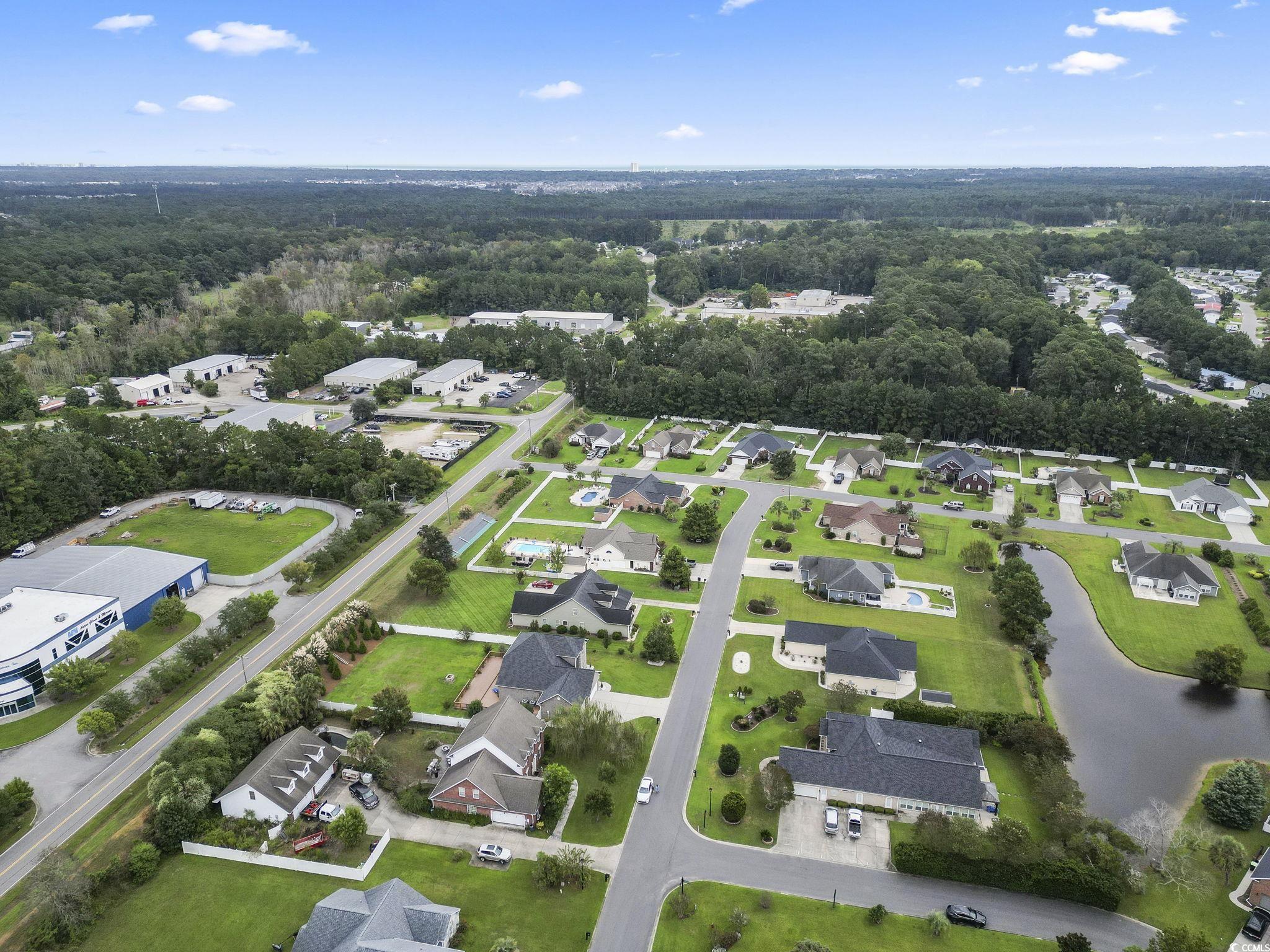 212 Duchess Court Myrtle Beach, SC 29588 - Photo 37 of 40 Aerial view of property and surrounding area with nearby suburban area