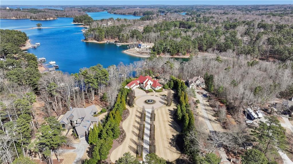 6525 Garrett Road Buford, GA 30518 - Photo 1 of 98 an aerial view of a house with a yard swimming pool