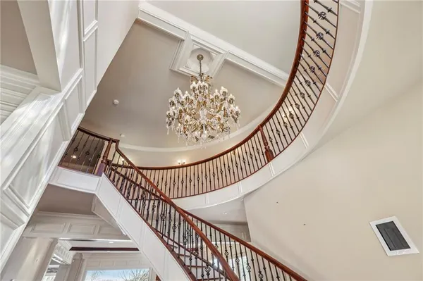 a bathroom with a sink a mirror and a shower