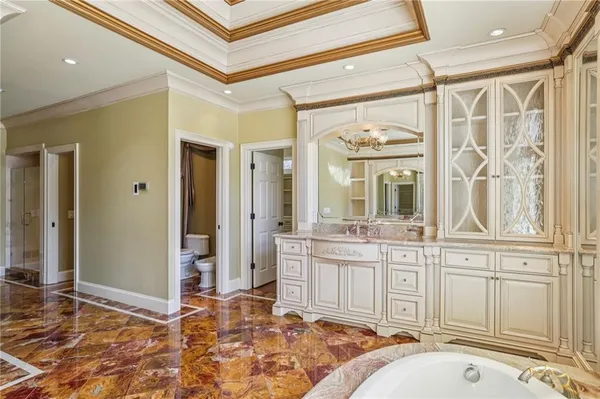 a view of yard covered with snow in front of house