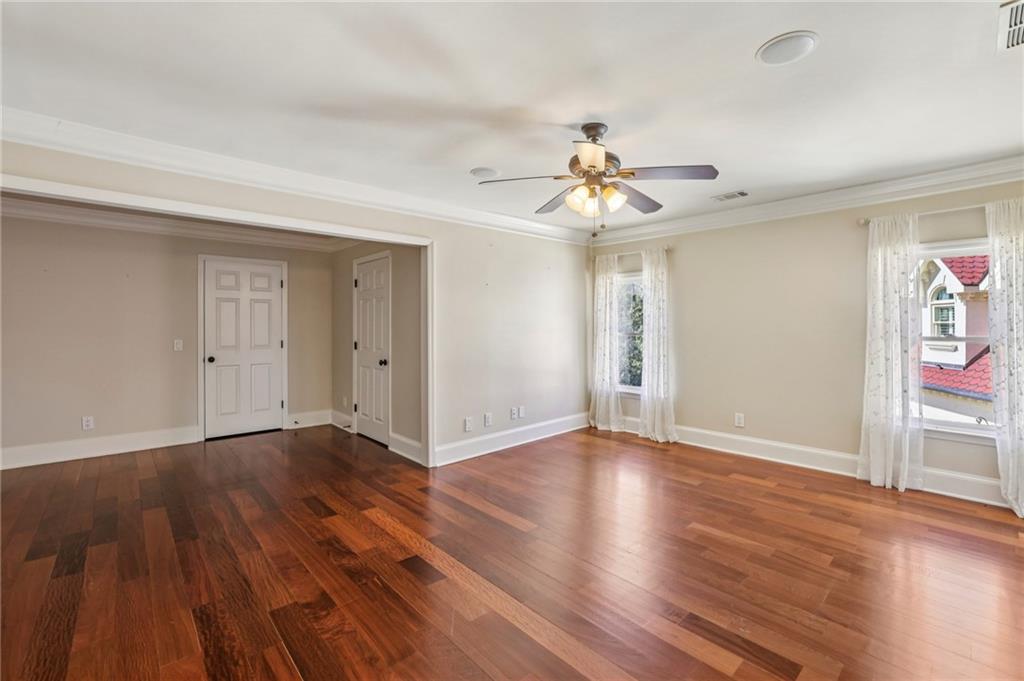 6525 Garrett Road Buford, GA 30518 - Photo 43 of 98 a view of an empty room with wooden floor