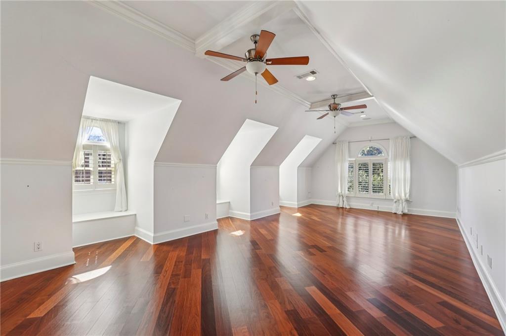 6525 Garrett Road Buford, GA 30518 - Photo 47 of 98 an empty room with wooden floor and windows