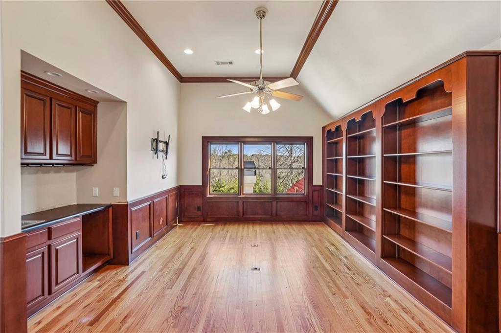 6525 Garrett Road Buford, GA 30518 - Photo 52 of 98 a view of wooden floor and windows in a room