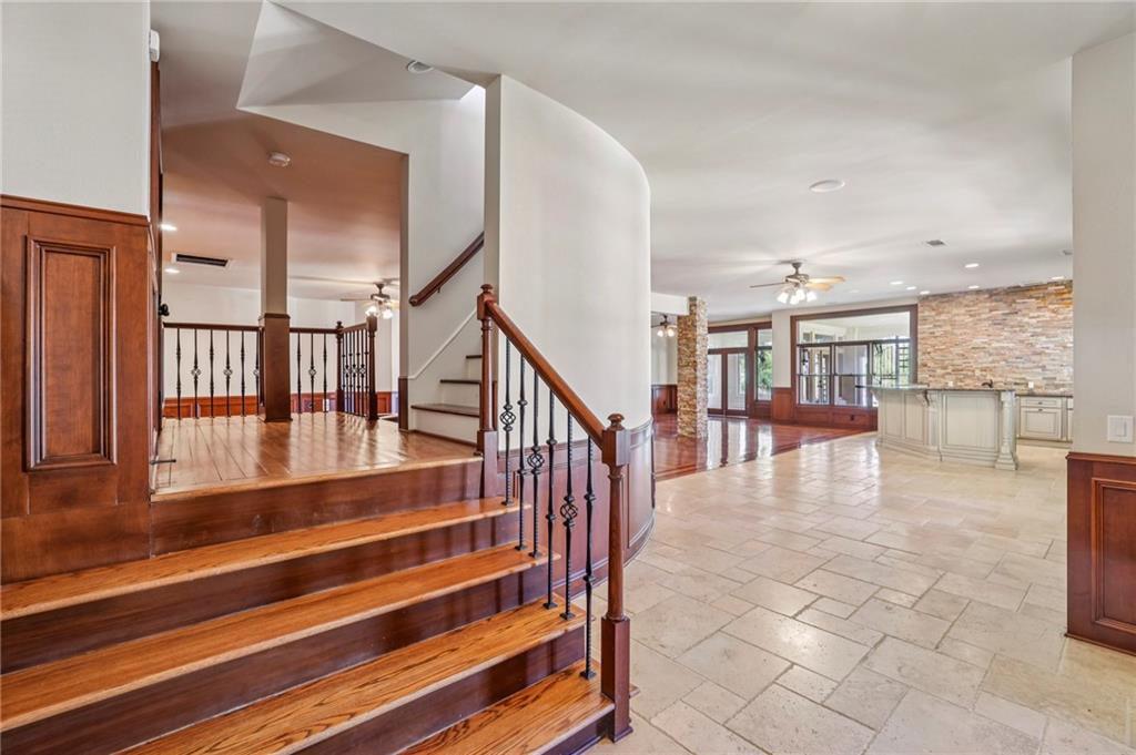 6525 Garrett Road Buford, GA 30518 - Photo 57 of 98 a view of entryway and hall with dining room