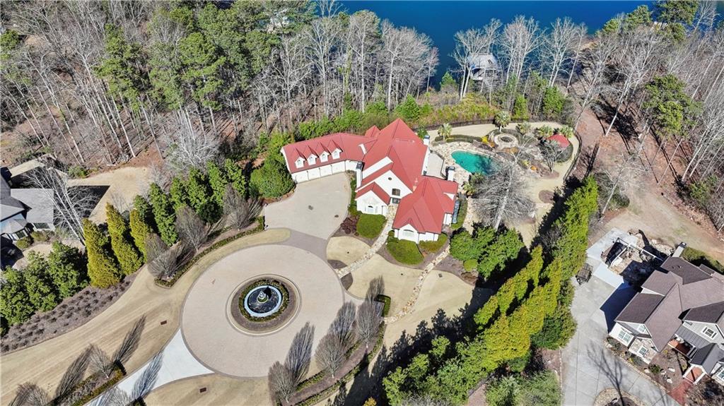 6525 Garrett Road Buford, GA 30518 - Photo 6 of 98 an aerial view of a house with a yard and garden