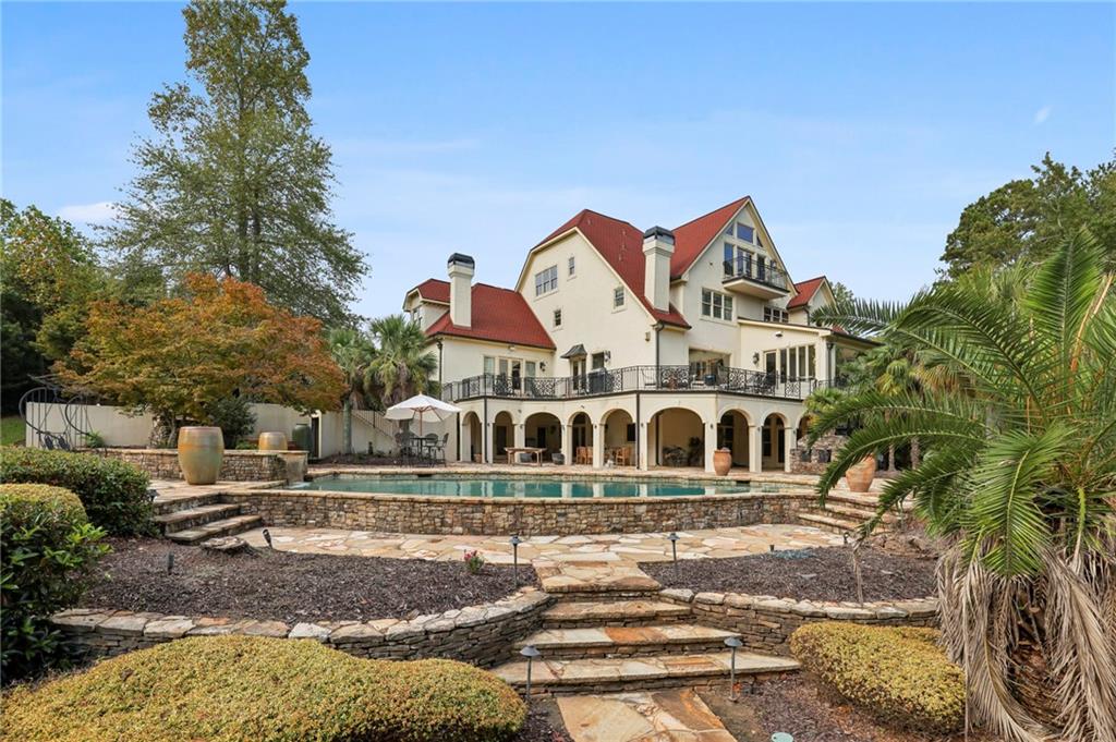 6525 Garrett Road Buford, GA 30518 - Photo 7 of 98 a front view of a house with a yard