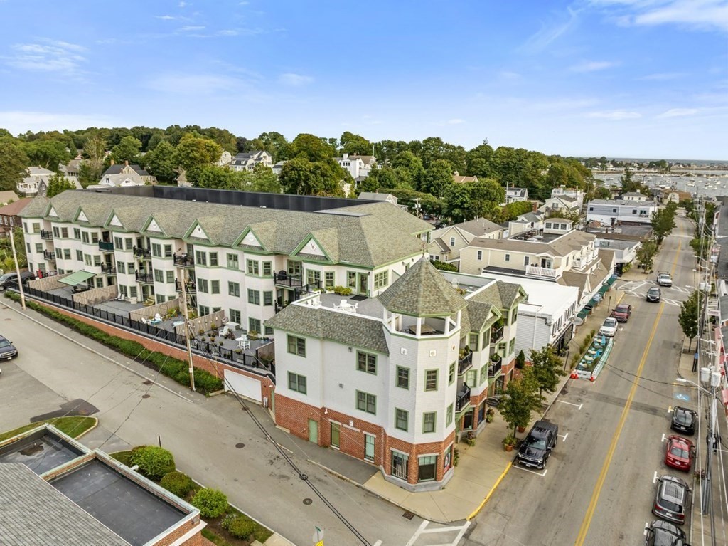 91 Front Street, Unit 104 Scituate, MA 02066 - Photo 25 of 26 a view of a city with tall buildings