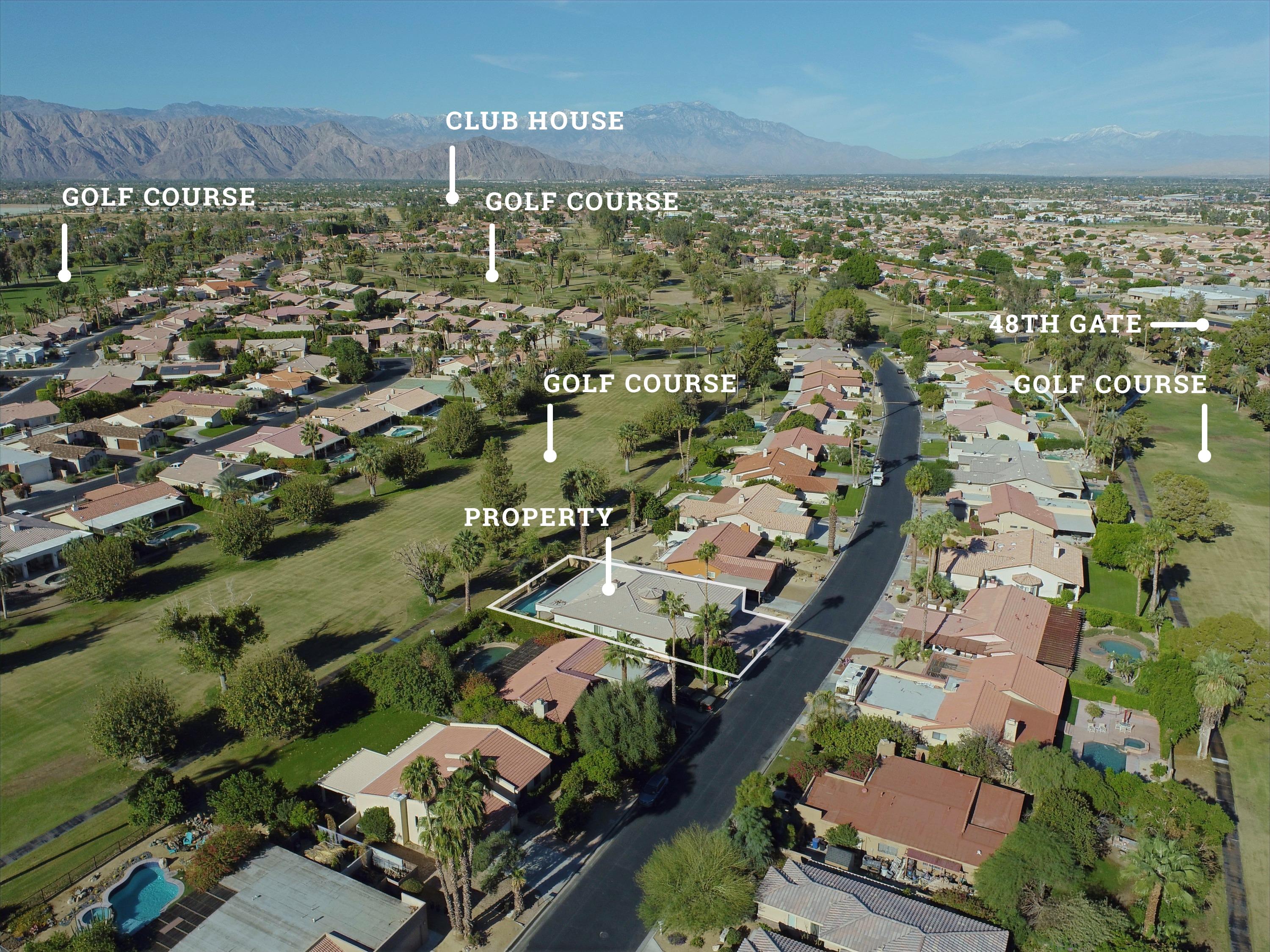 82553 Doolittle Drive Indio, CA 92201 - Photo 2 of 47 an aerial view of residential houses with outdoor space