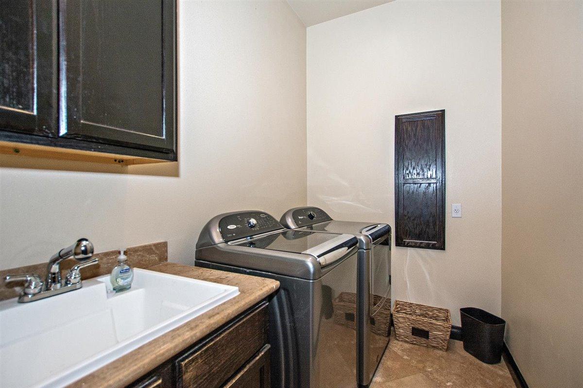 82553 Doolittle Drive Indio, CA 92201 - Photo 32 of 47 a room with storage and utility