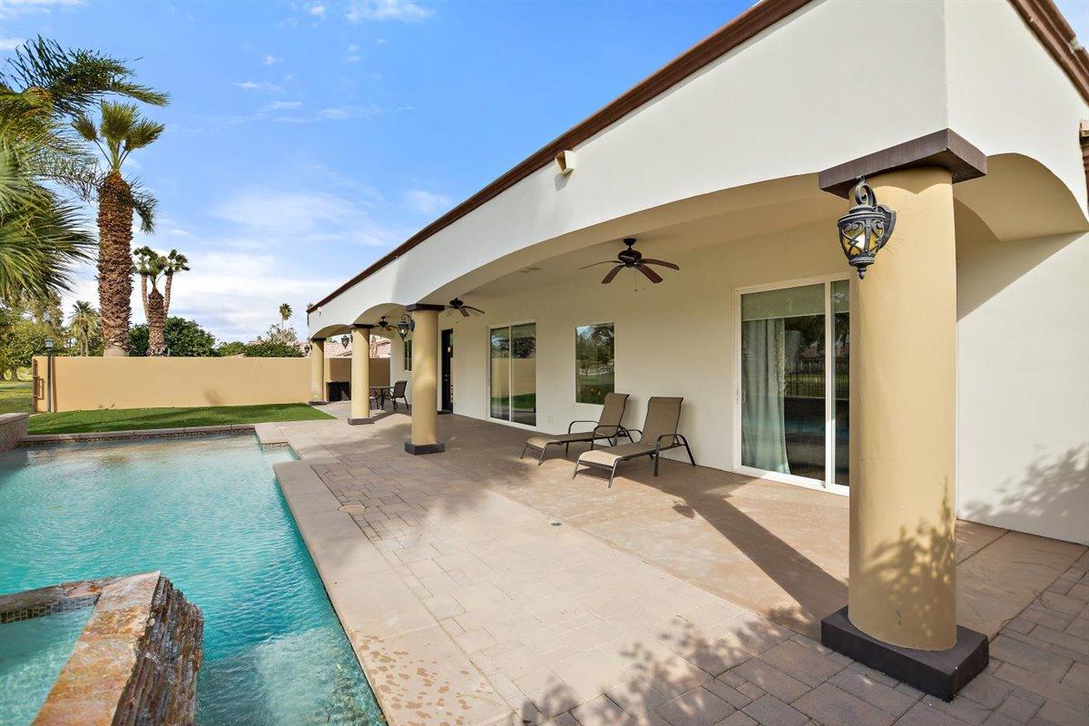 82553 Doolittle Drive Indio, CA 92201 - Photo 38 of 47 a view of a house with backyard sitting area and tub