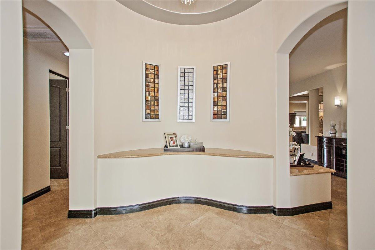 82553 Doolittle Drive Indio, CA 92201 - Photo 4 of 47 a bathroom with a tub sink and mirror