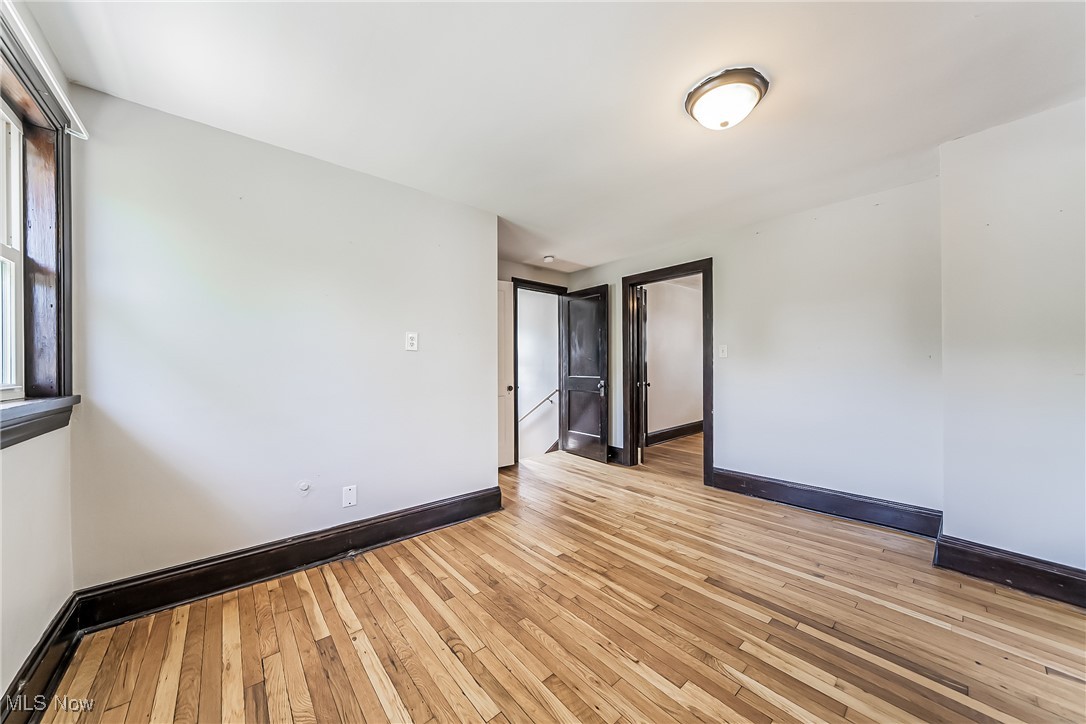 1801 Rockefeller Road Wickliffe, OH 44092 - Photo 9 of 37 Empty room with light hardwood / wood-style floors