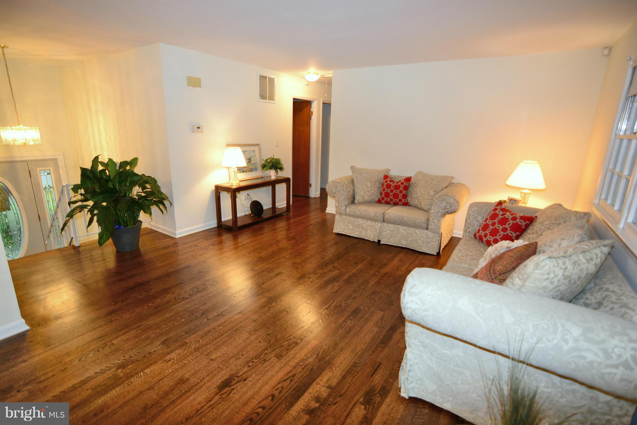 1563 Long Point Road Pasadena, MD 21122 - Photo 6 of 26 Open living room w/ newly refinished HW floors