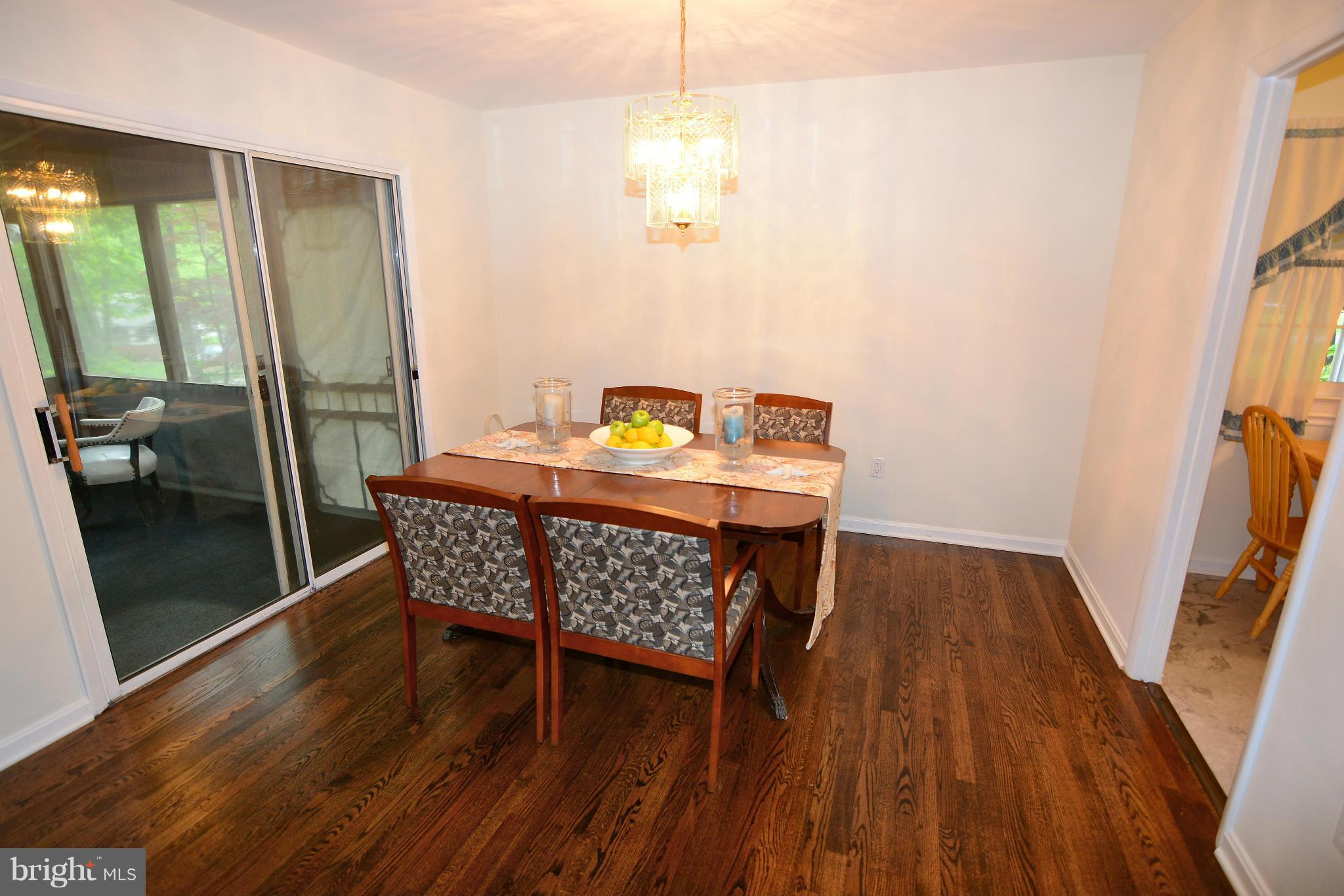 1563 Long Point Road Pasadena, MD 21122 - Photo 8 of 26 Dining room opens to kitchen and porch