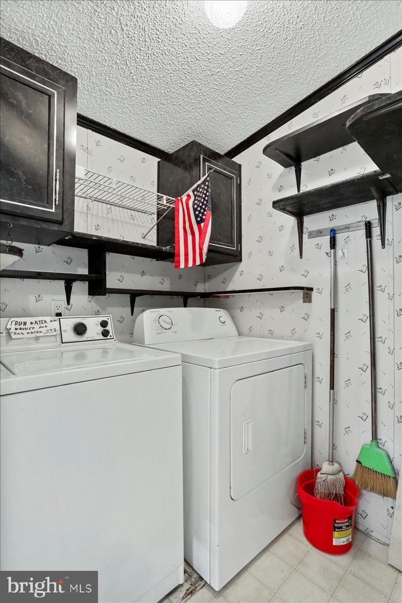 111 North Fairfax Boulevard Ranson, WV 25438 - Photo 16 of 32 a utility room with dryer and washer