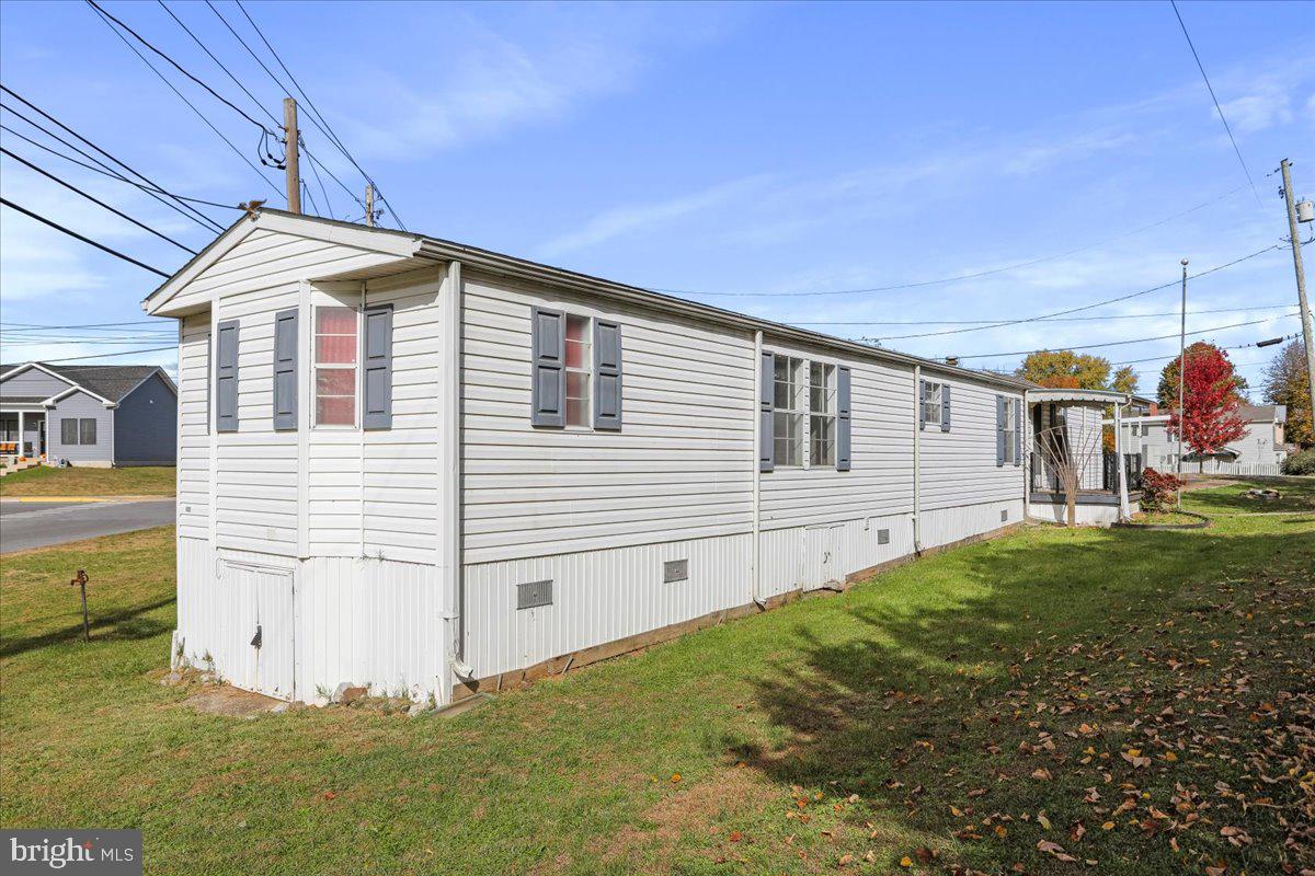 111 North Fairfax Boulevard Ranson, WV 25438 - Photo 2 of 32 a view of a house with backyard