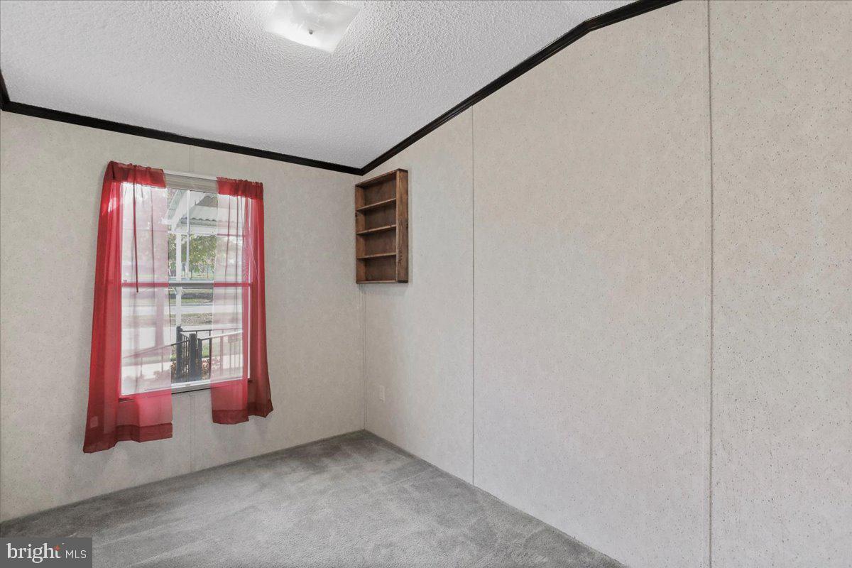 111 North Fairfax Boulevard Ranson, WV 25438 - Photo 23 of 32 a view of an empty room with a window