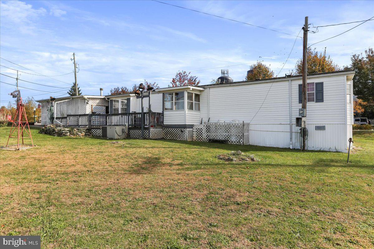 111 North Fairfax Boulevard Ranson, WV 25438 - Photo 30 of 32 a view of a house with a yard