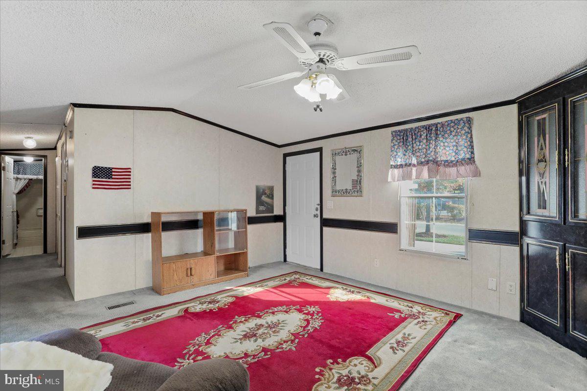 111 North Fairfax Boulevard Ranson, WV 25438 - Photo 7 of 32 a bedroom with furniture and a large window