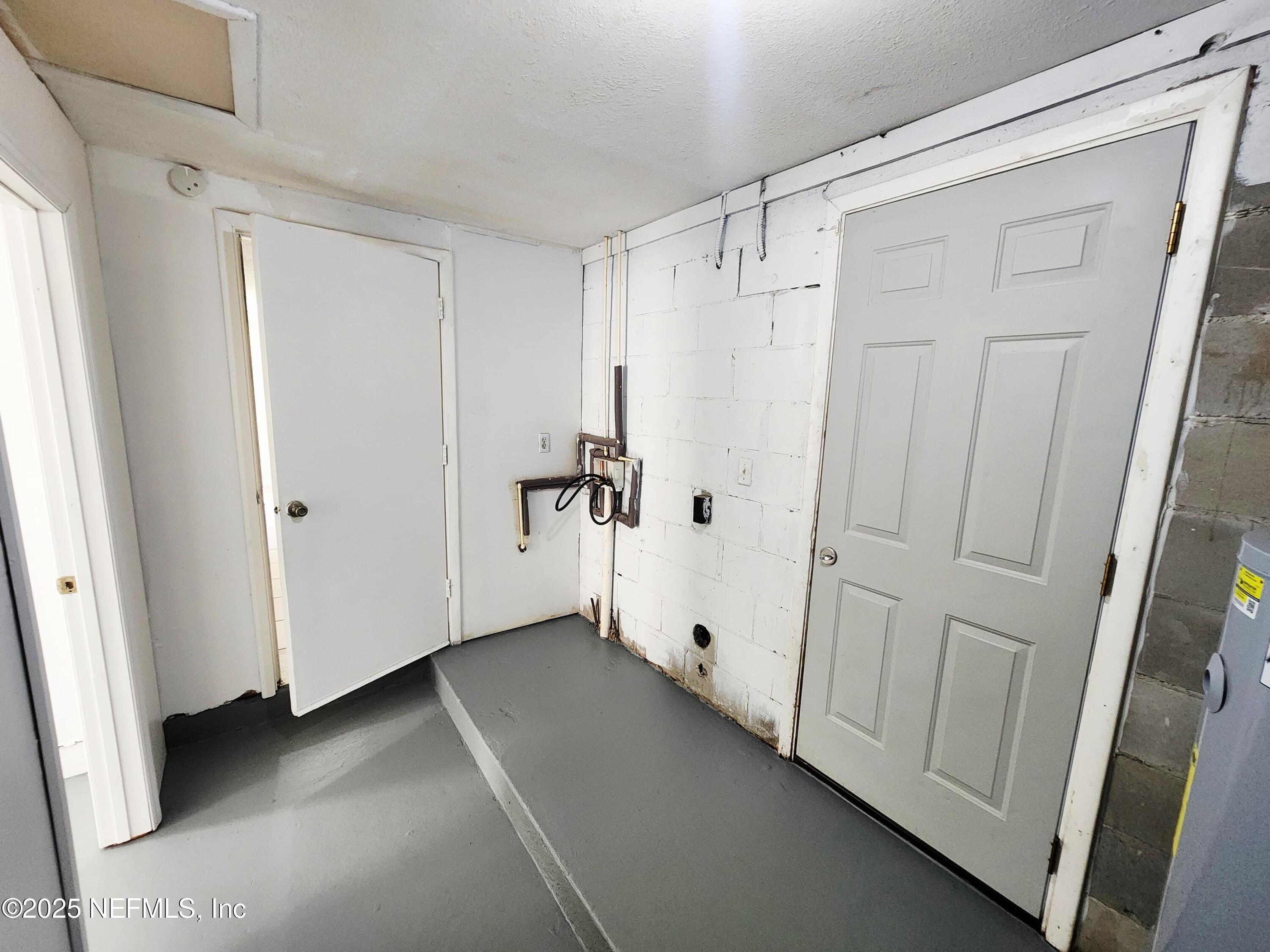 7127 Prellie Street Jacksonville, FL 32210 - Photo 12 of 16 a view of a bathroom with a tub