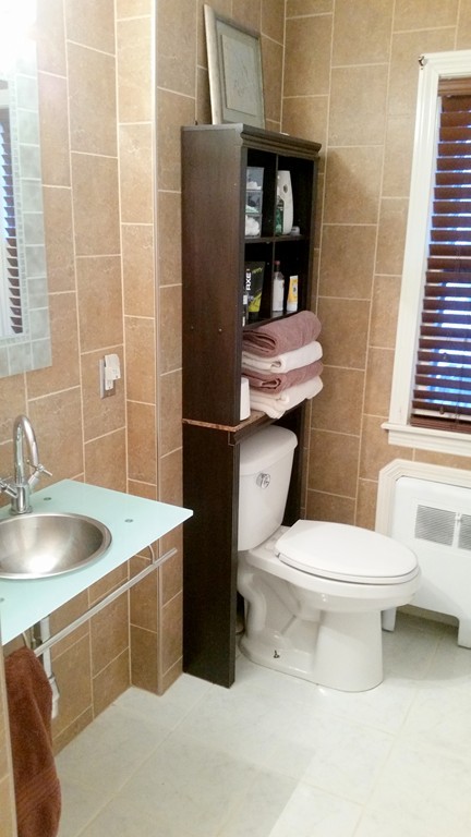 237 Draper Street Springfield, MA 01108 - Photo 11 of 30 a bathroom with a sink toilet and shower