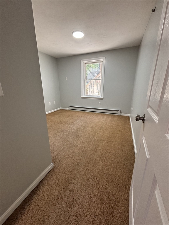 249 Division Street, Unit 1C Fall River, MA 02721 - Photo 5 of 7 a view of a room with window