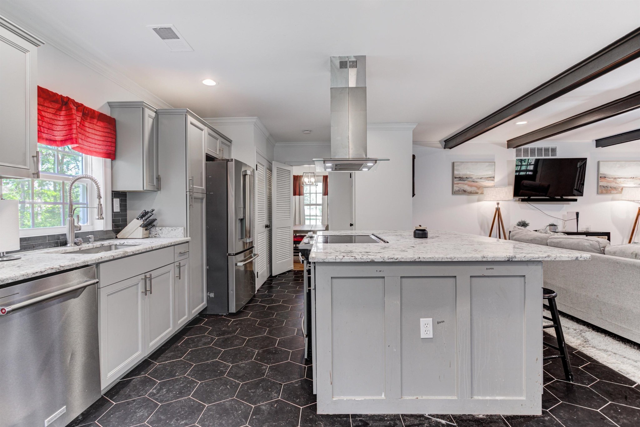 8929 Rocky Point Road Cordova, TN 38018 - Photo 13 of 37 a kitchen with stainless steel appliances a sink stove and refrigerator