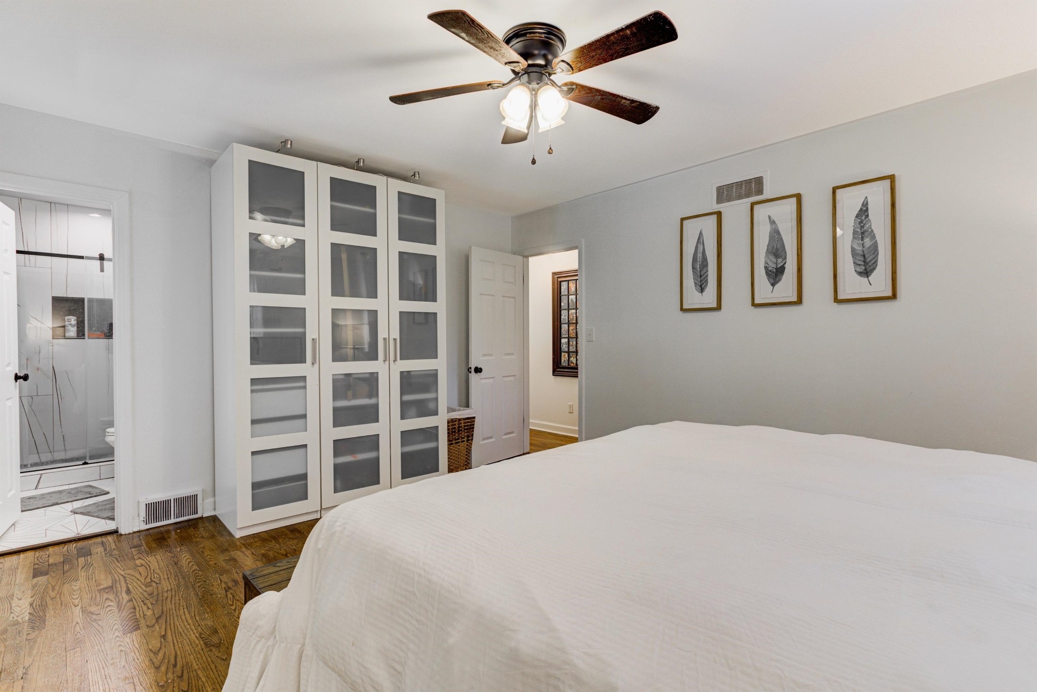 8929 Rocky Point Road Cordova, TN 38018 - Photo 20 of 37 a bedroom with a large bed and a window