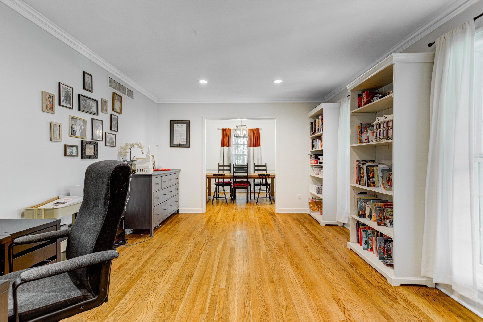8929 Rocky Point Road Cordova, TN 38018 - Photo 2 of 37 a room with furniture and a bookshelf