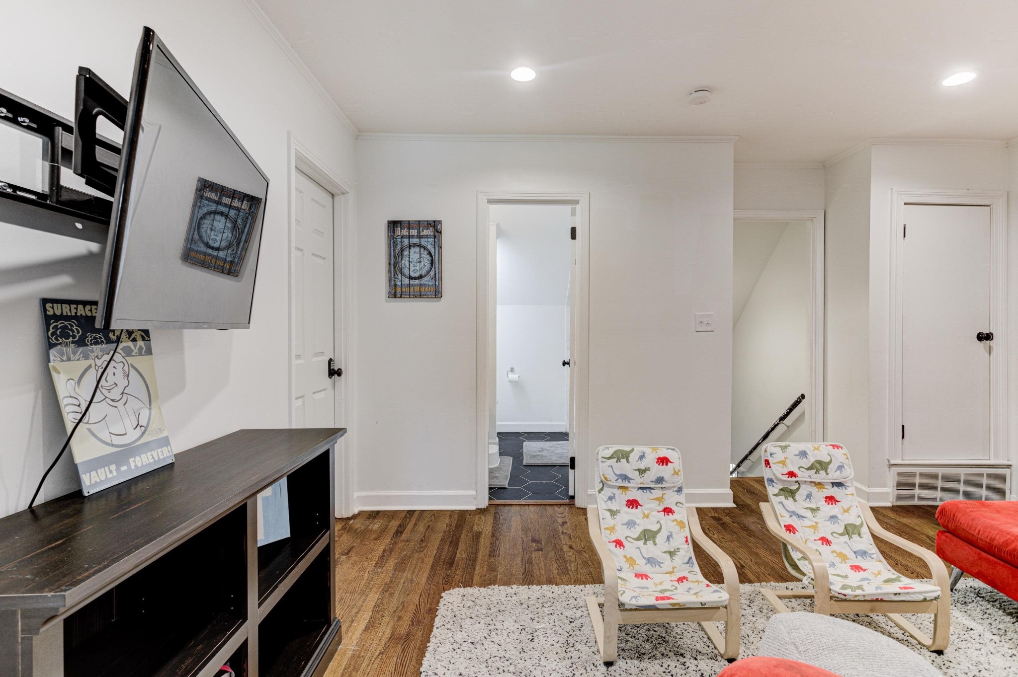 8929 Rocky Point Road Cordova, TN 38018 - Photo 24 of 37 a room with furniture and a wooden floor