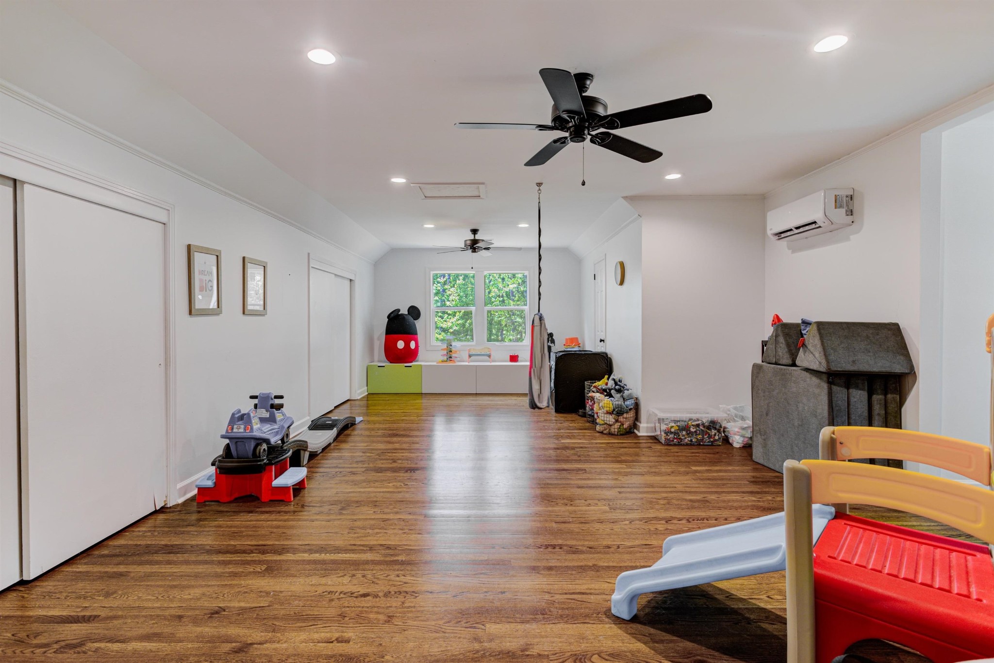 8929 Rocky Point Road Cordova, TN 38018 - Photo 26 of 37 a living room with furniture and a wooden floor