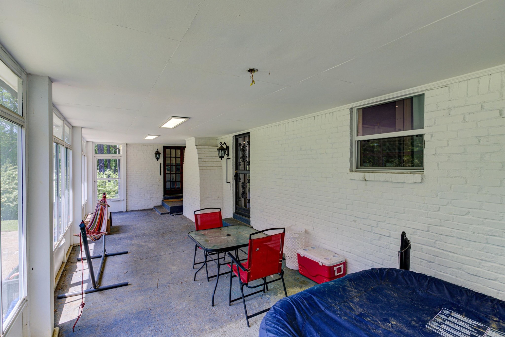 8929 Rocky Point Road Cordova, TN 38018 - Photo 28 of 37 a living room with furniture and wooden floor
