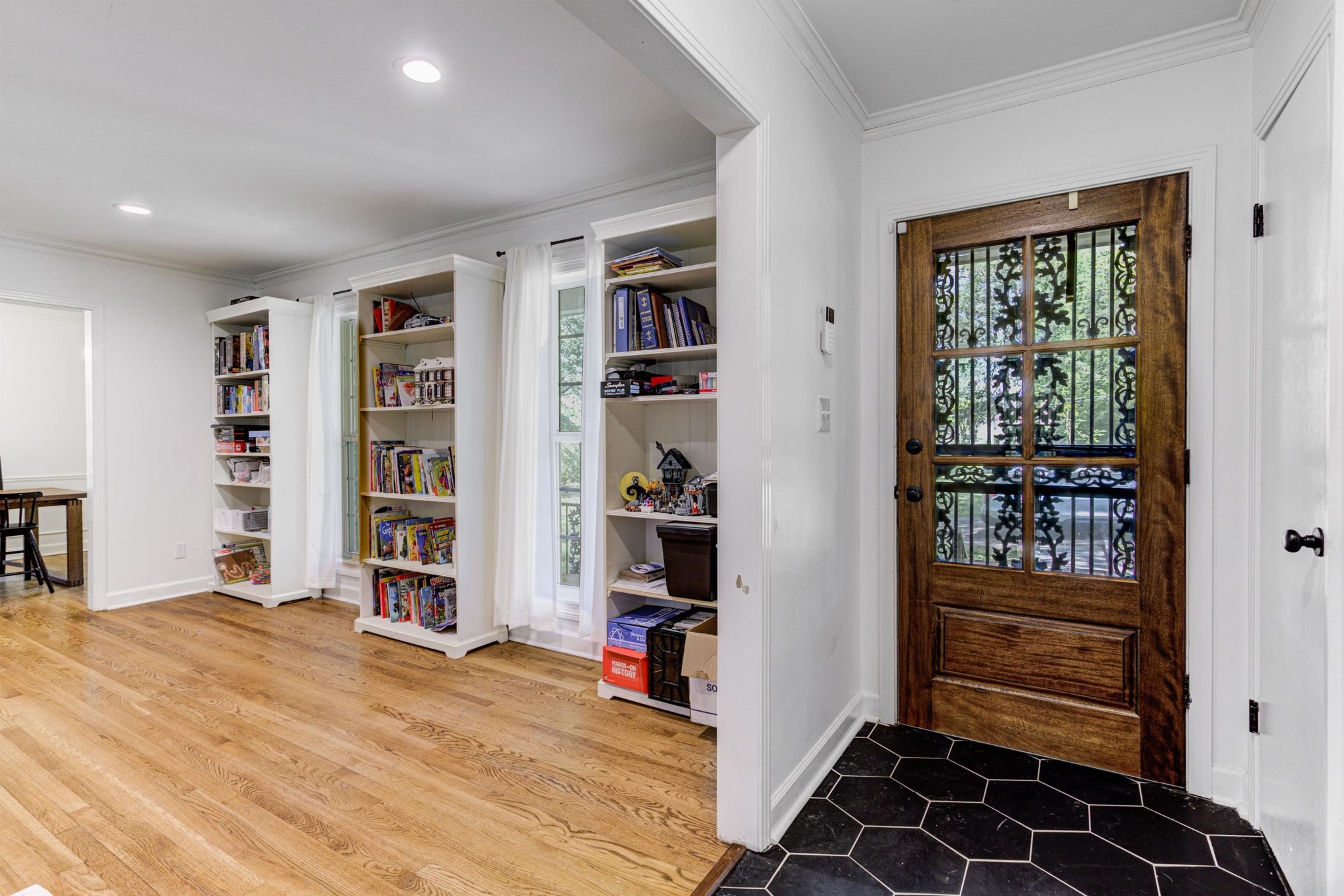 8929 Rocky Point Road Cordova, TN 38018 - Photo 3 of 37 a room with furniture and a book shelf