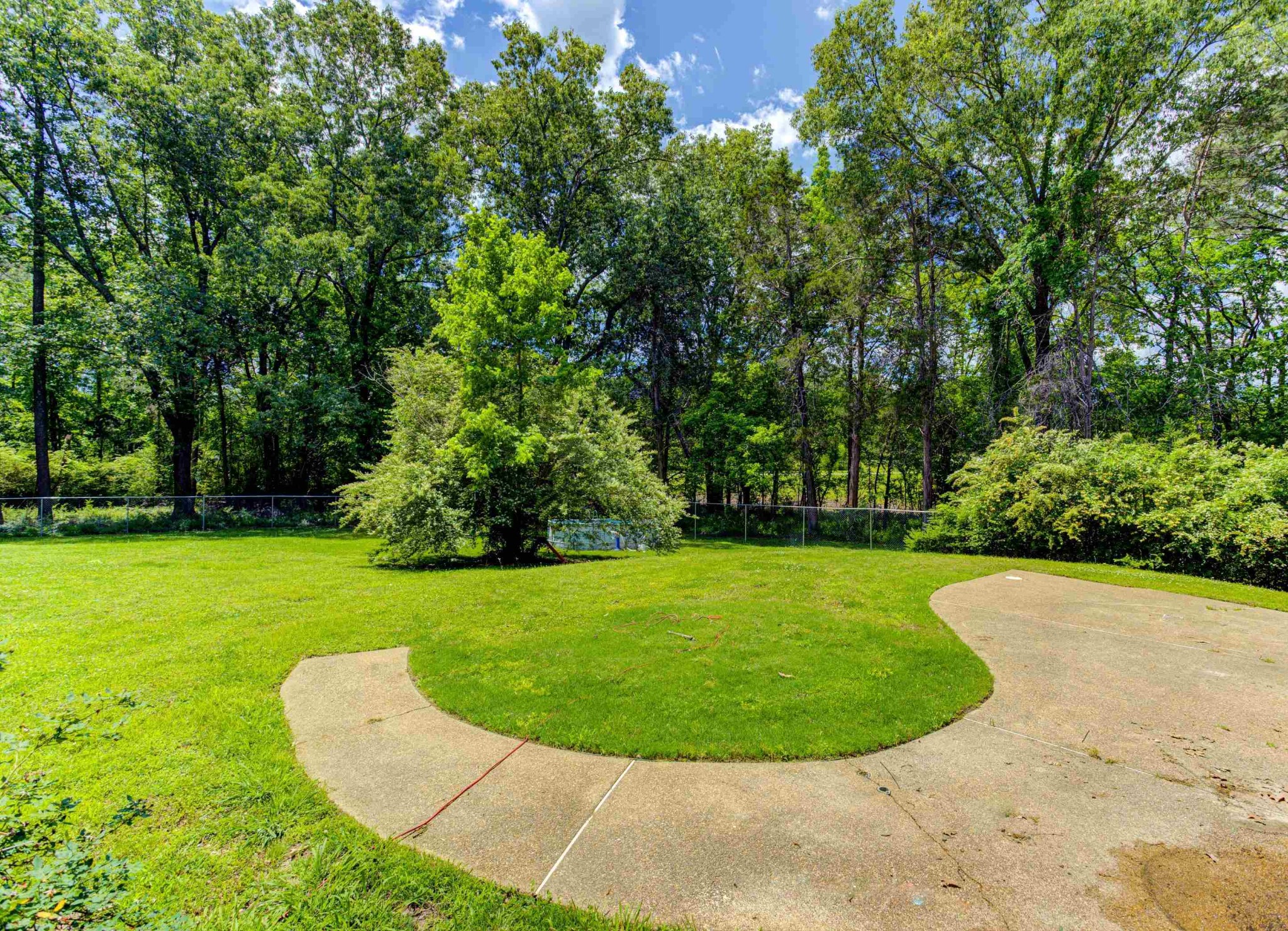 8929 Rocky Point Road Cordova, TN 38018 - Photo 31 of 37 a view of a swimming pool in a backyard