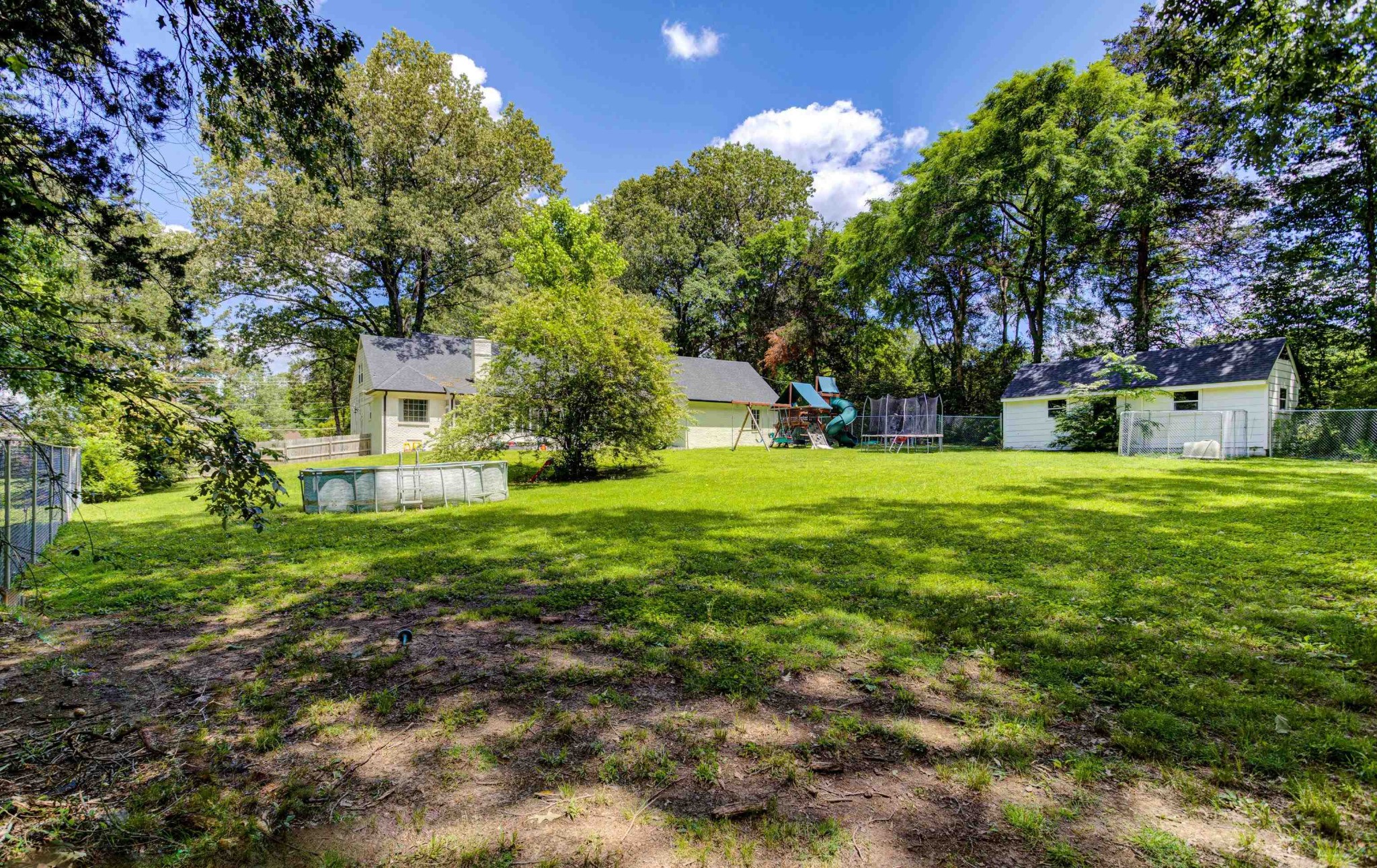 8929 Rocky Point Road Cordova, TN 38018 - Photo 33 of 37 a view of a house with a yard