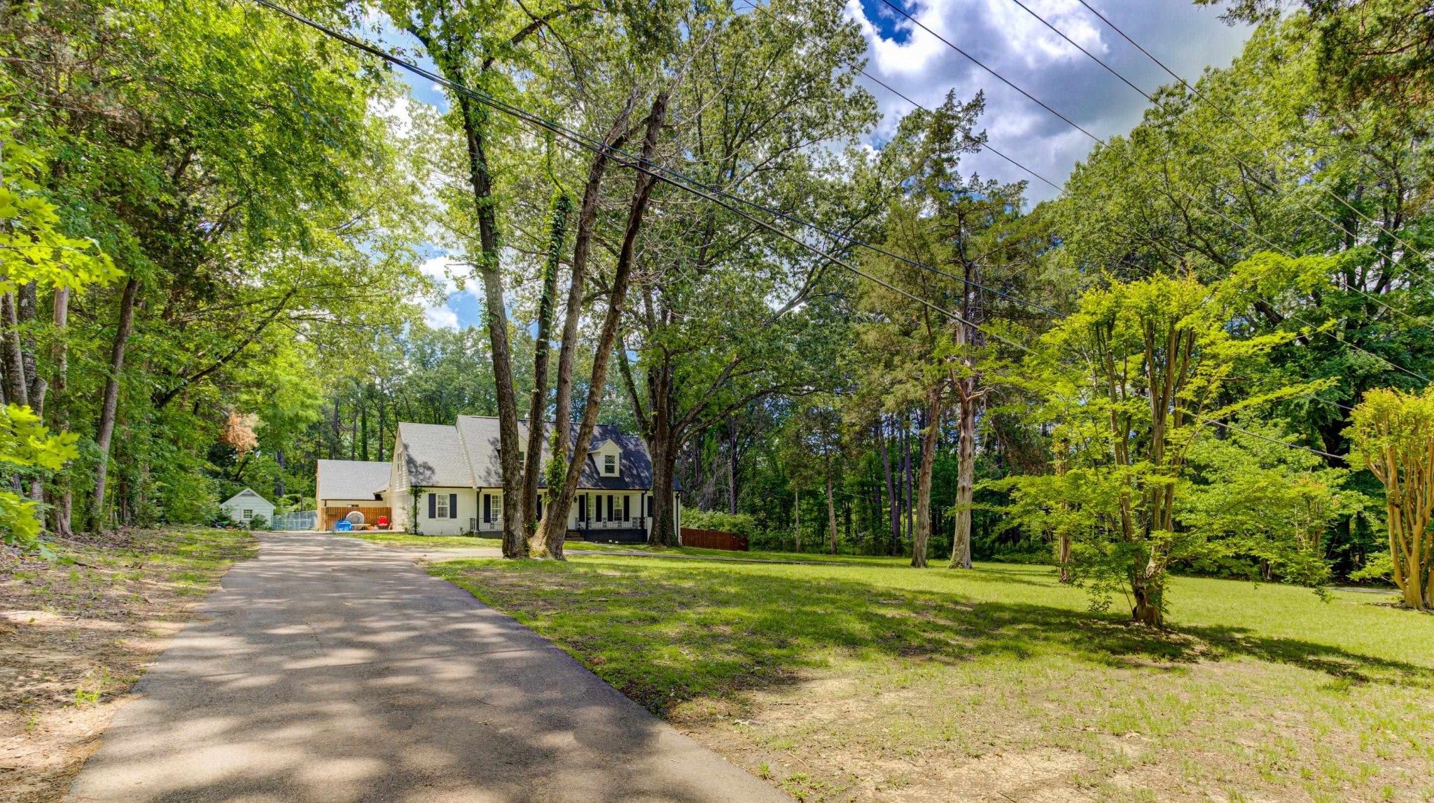 8929 Rocky Point Road Cordova, TN 38018 - Photo 34 of 37 a view of a park with large trees