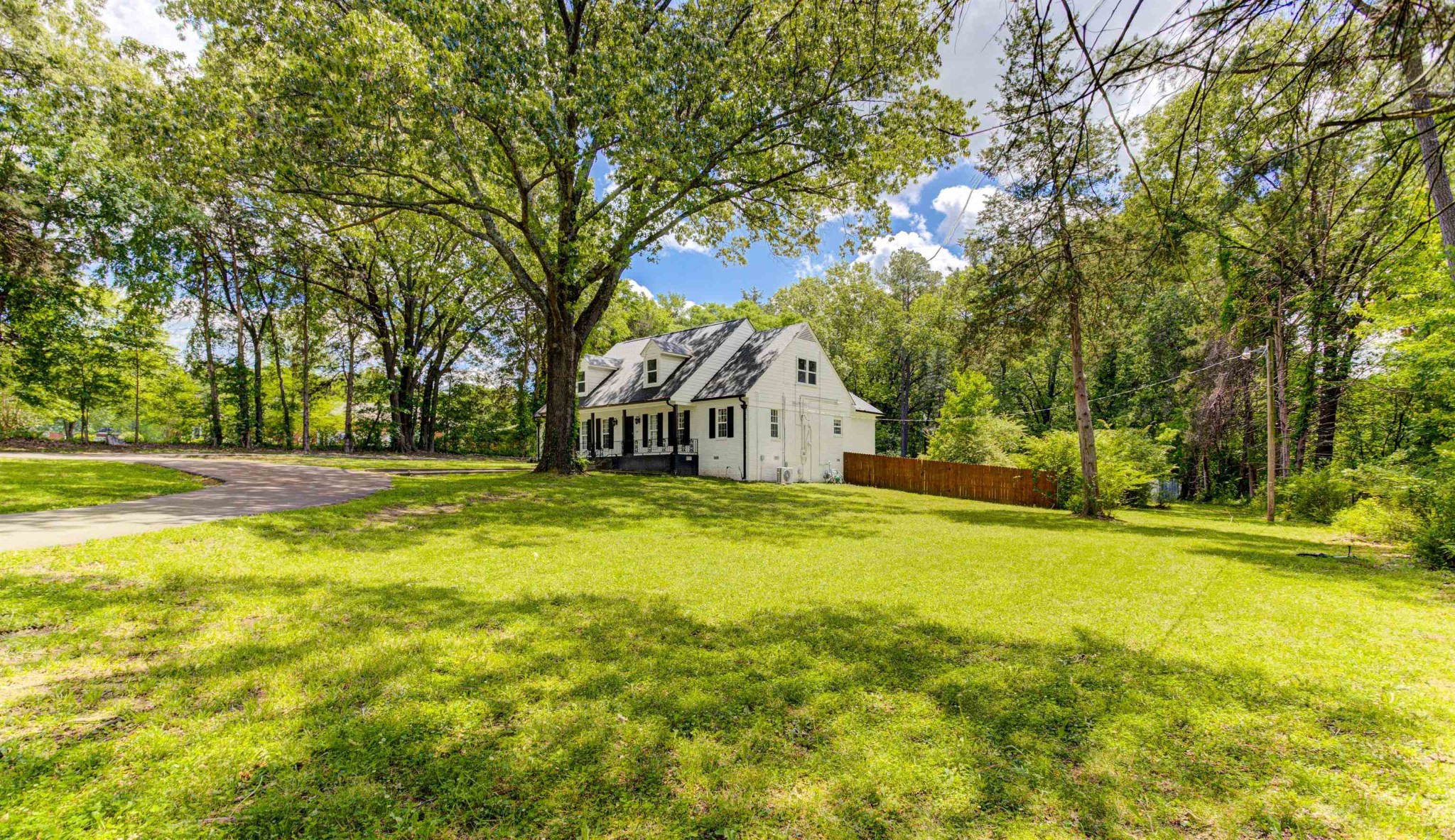 8929 Rocky Point Road Cordova, TN 38018 - Photo 35 of 37 a view of swimming pool with large trees and plants