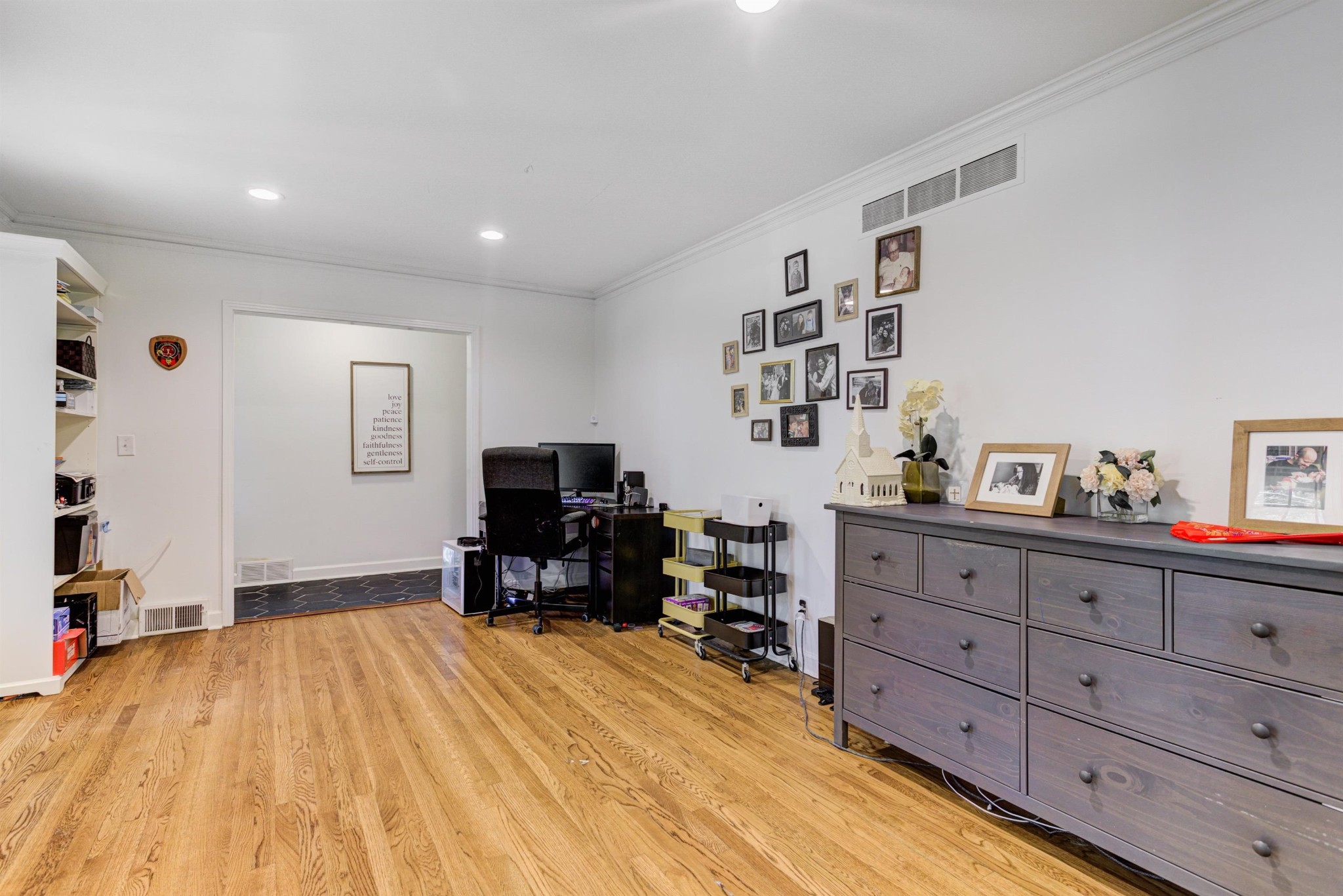 8929 Rocky Point Road Cordova, TN 38018 - Photo 4 of 37 a bed room with a bed and a television