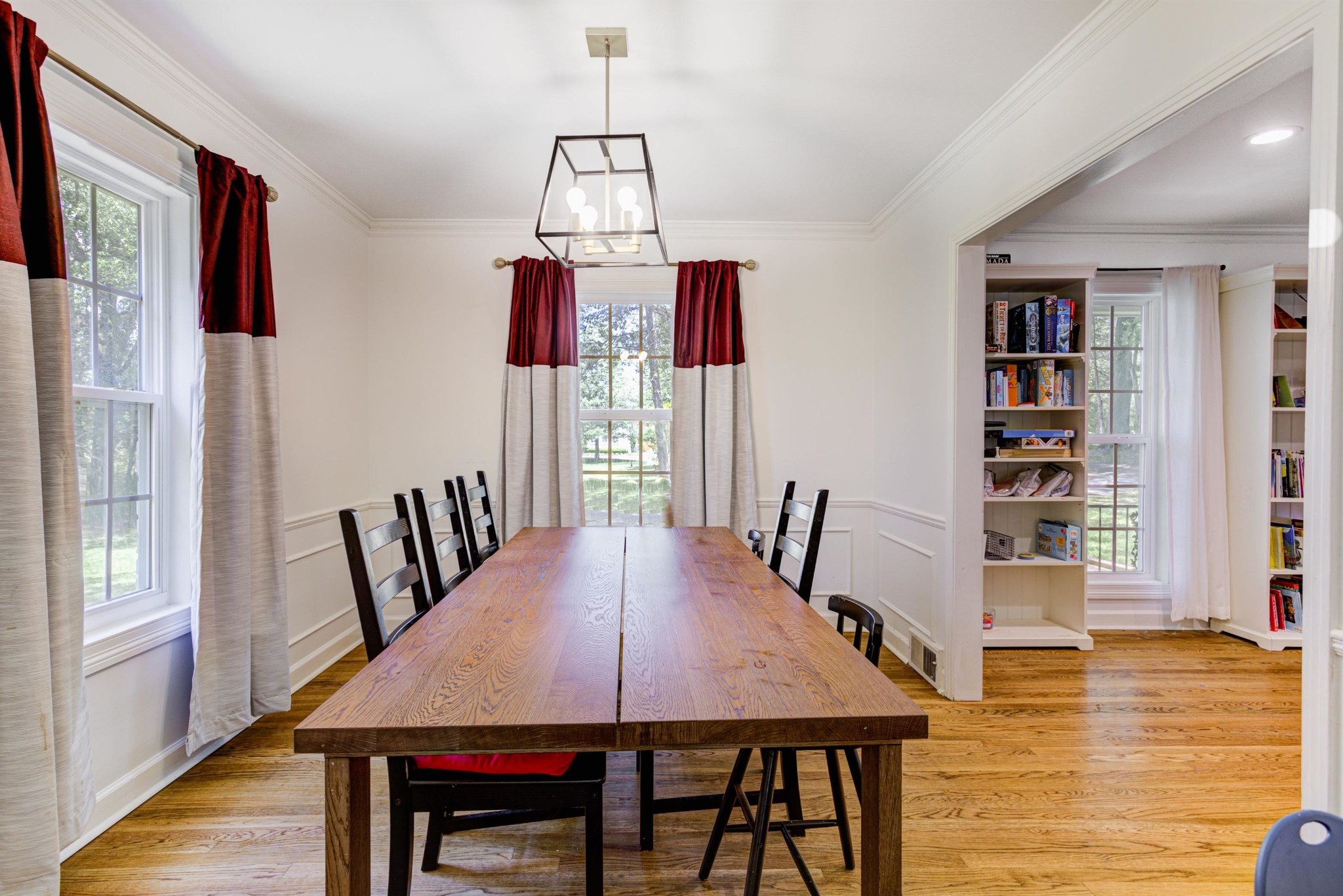 8929 Rocky Point Road Cordova, TN 38018 - Photo 6 of 37 a view of a dining room with furniture window and wooden floor